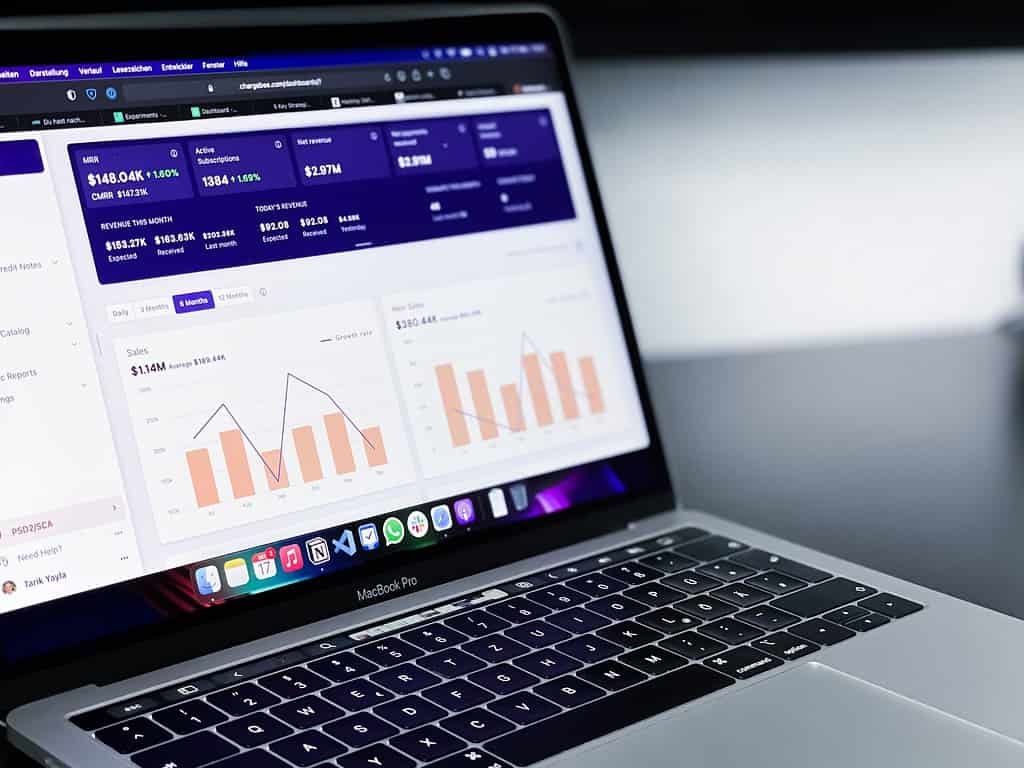 laptop showing multiple charts